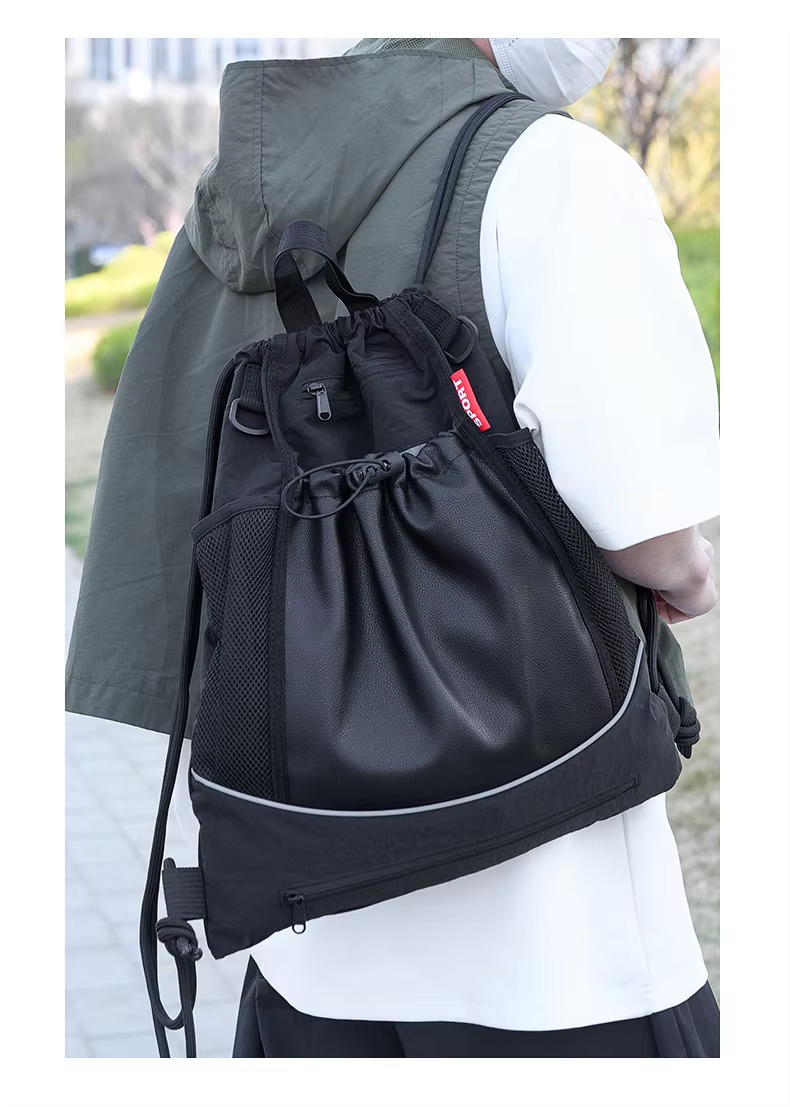man wearing black backpack