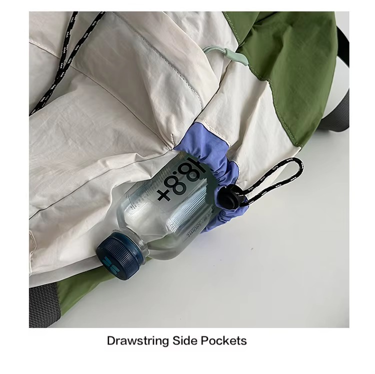 drawstring side pocket holding water bottle