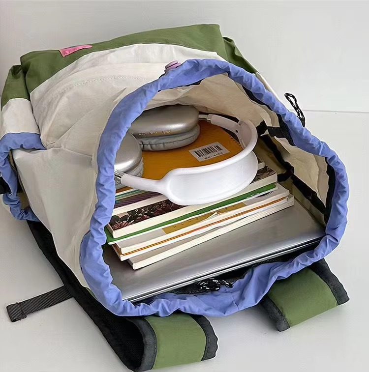 books and headphones inside main compartment