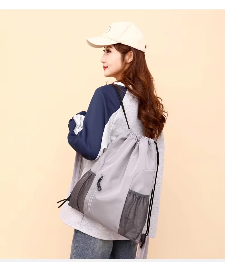 gray backpack side angle