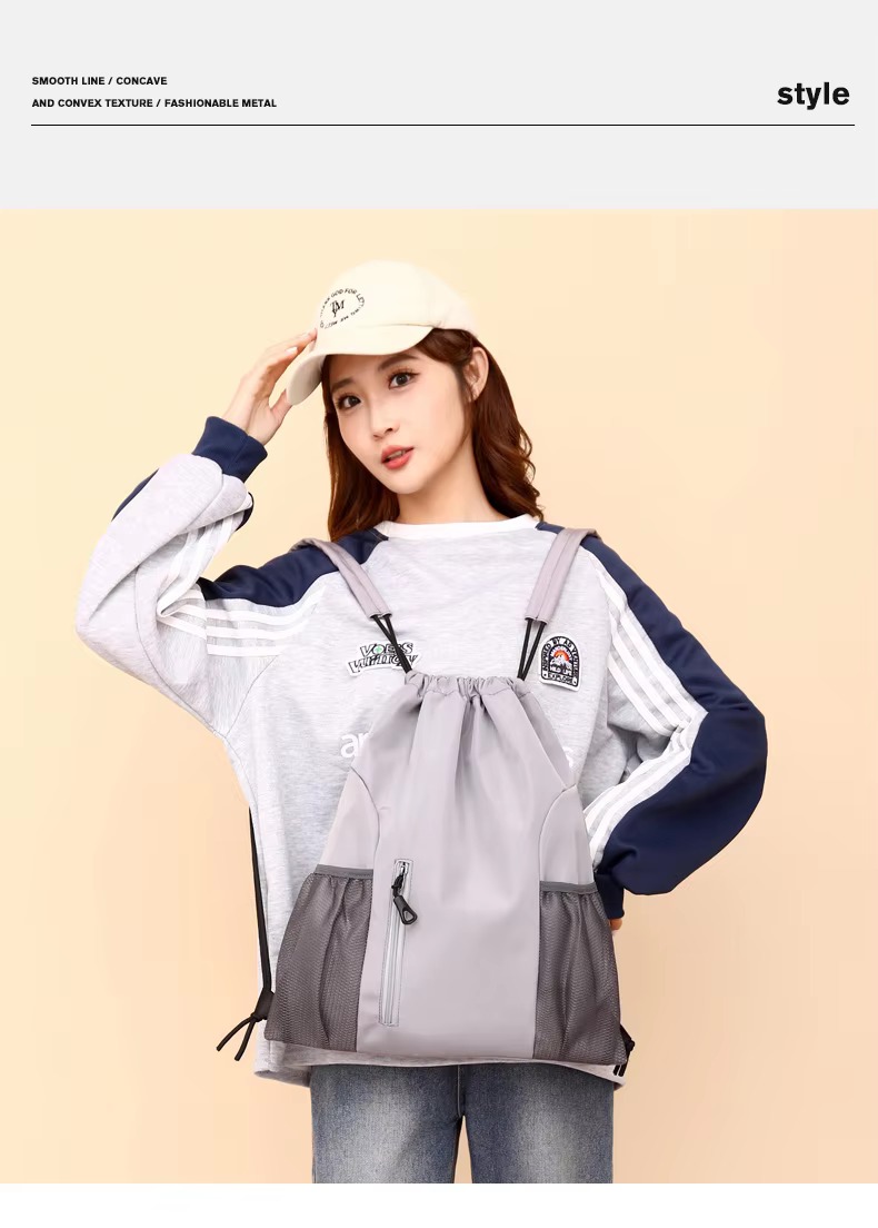 woman wearing gray backpack front