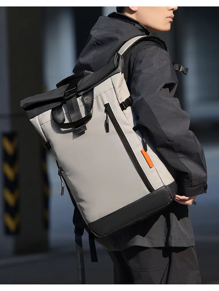 man wearing beige backpack side view