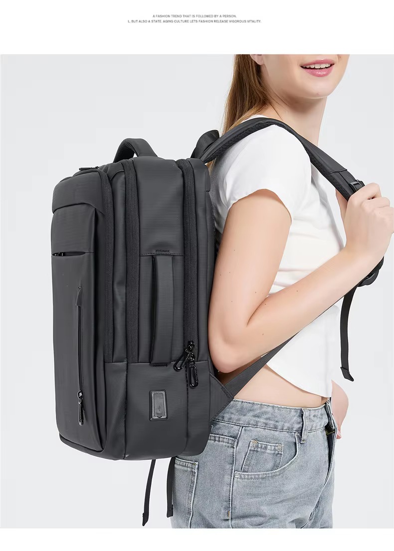 woman wearing black backpack side view