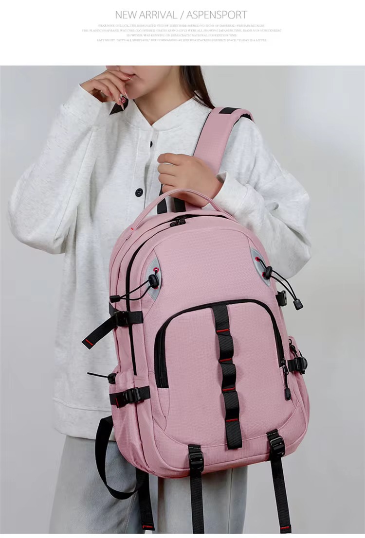 woman holding pink backpack