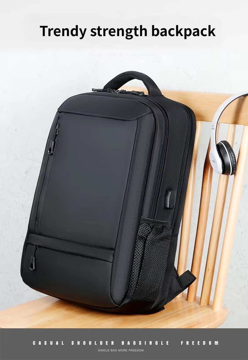 black backpack on wooden chair with headphones