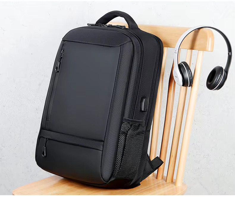 backpack on chair with headphones