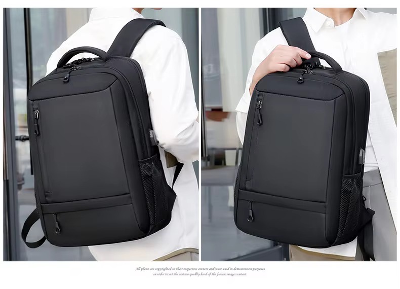 man wearing and holding backpack