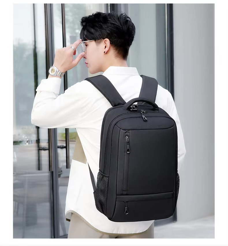 man wearing black backpack
