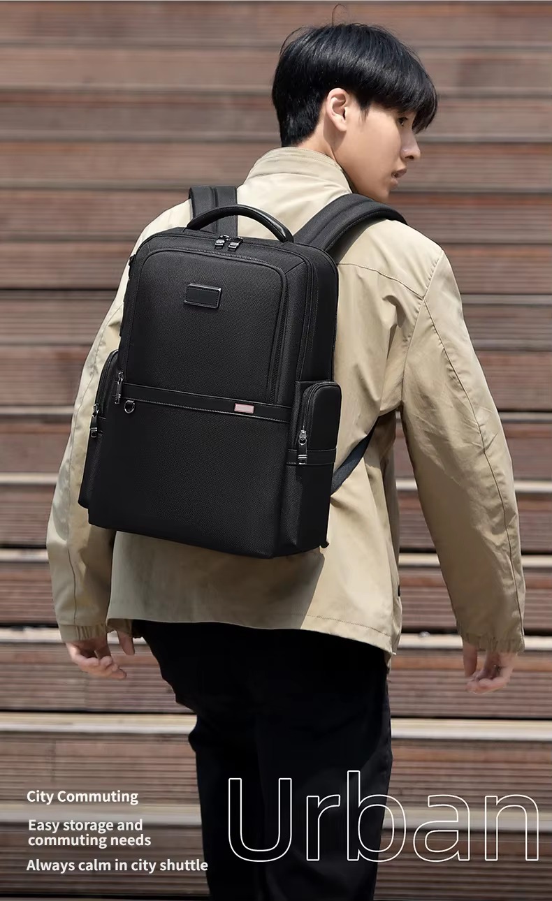 man walking with black backpack for city commuting