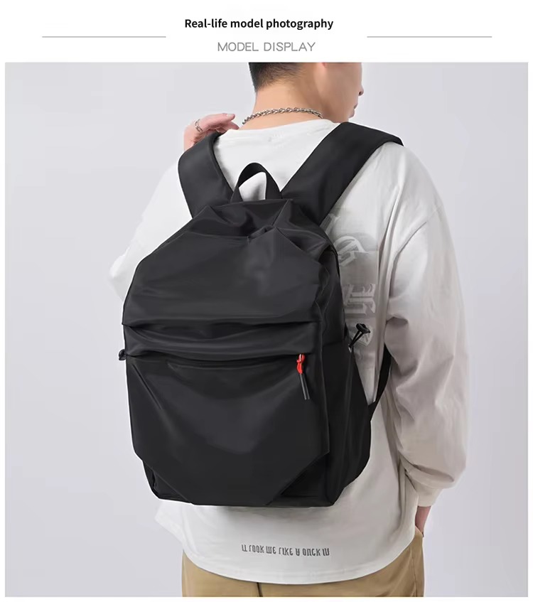 man wearing black backpack