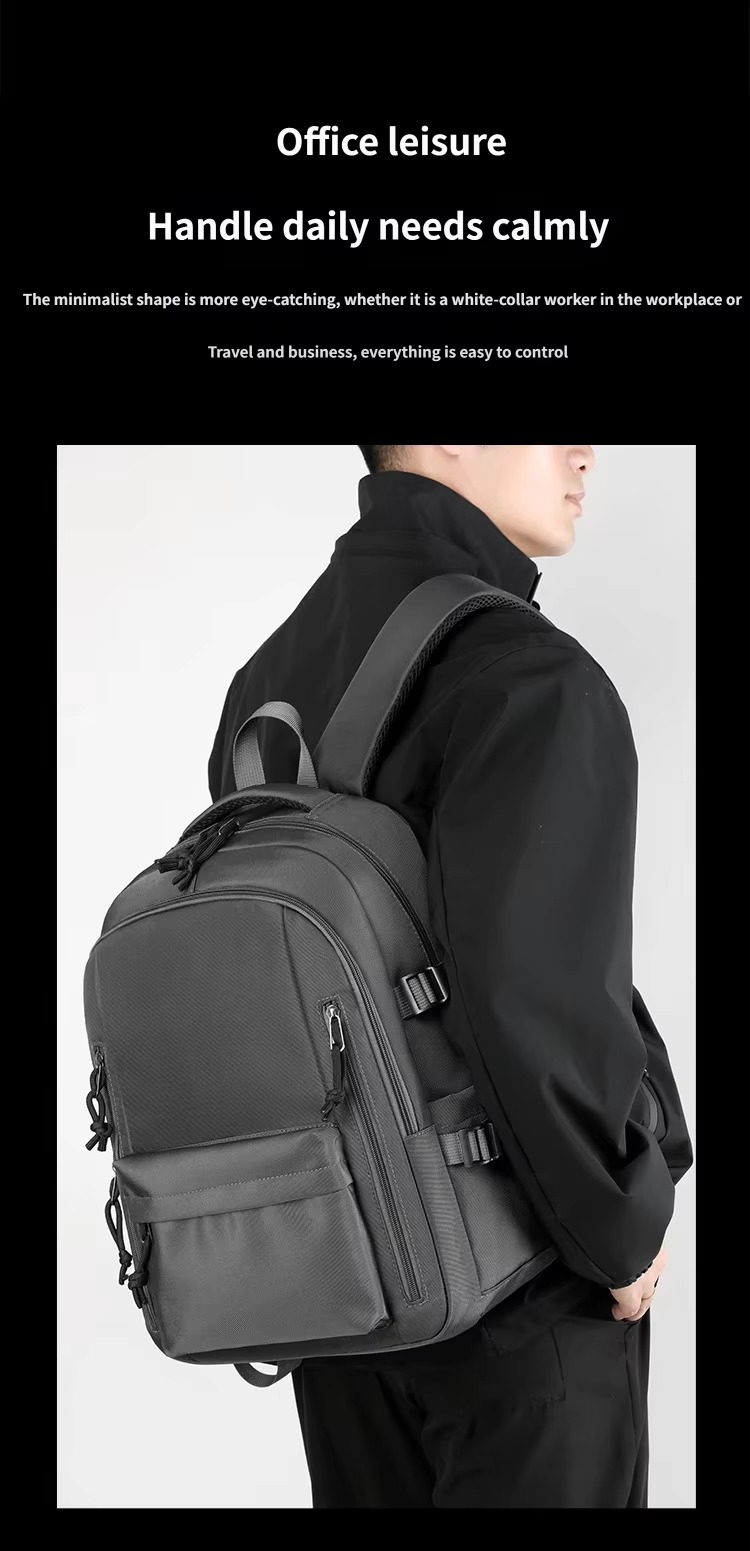 man wearing gray backpack in office leisure style