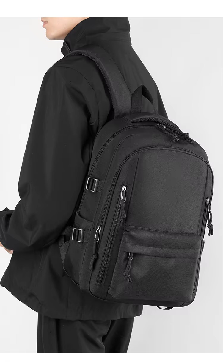 man wearing black backpack