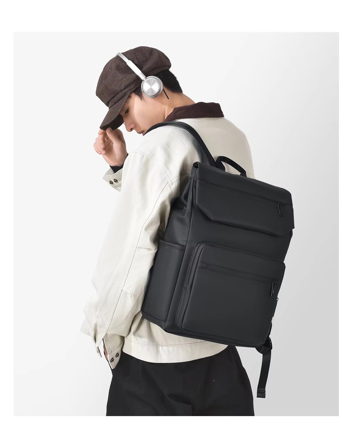man wearing black backpack