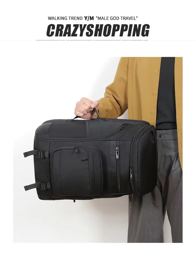 man carrying backpack by side handle