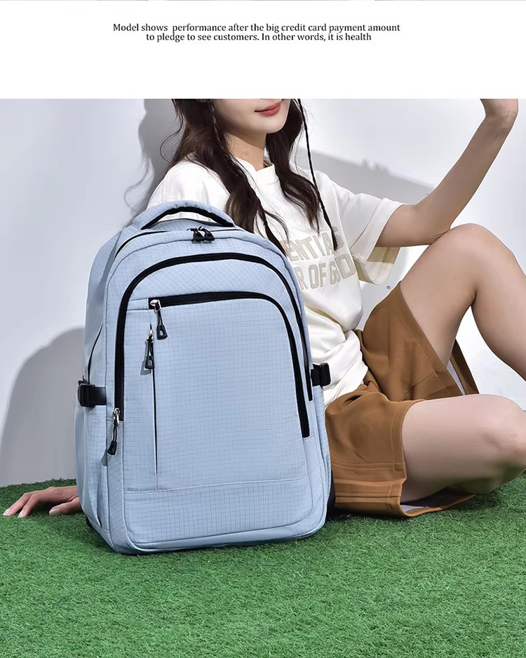 blue backpack on grass