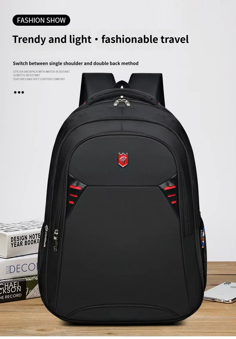 black backpack with red accents on desk