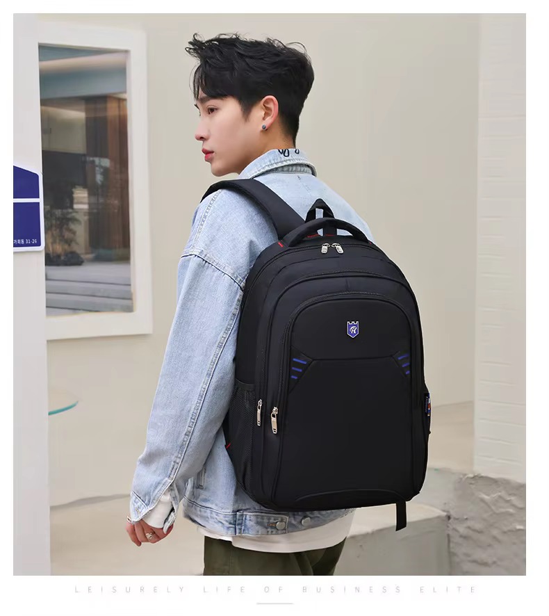 man wearing backpack side view