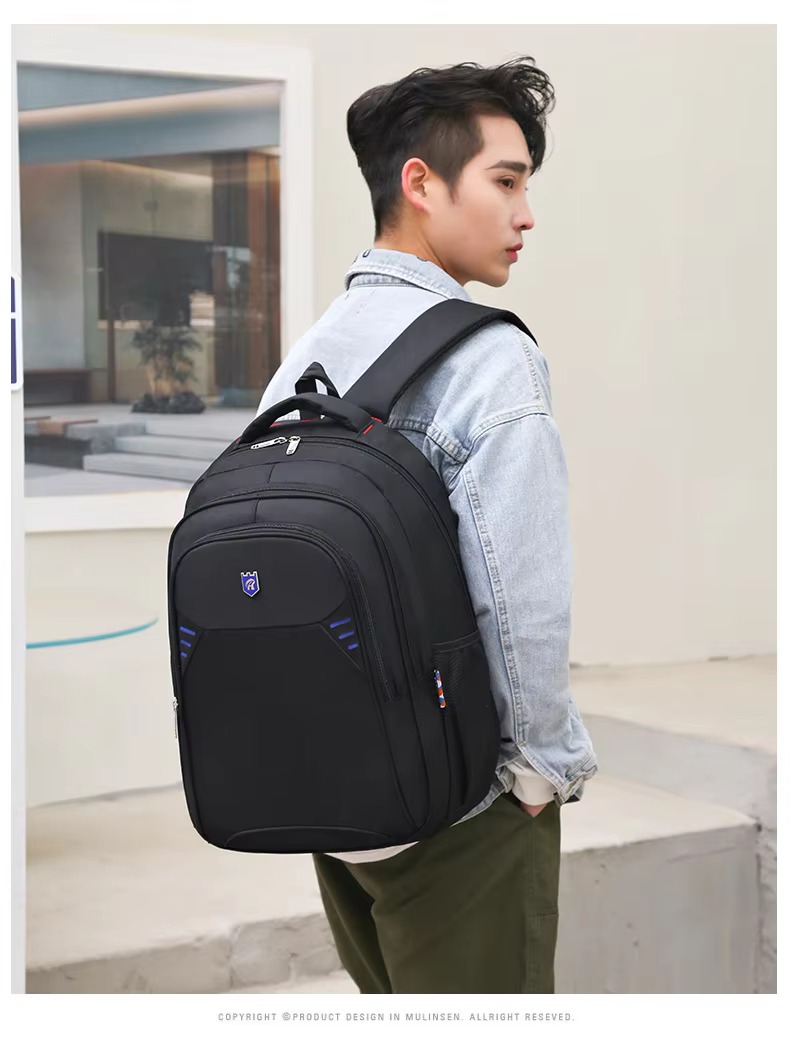 man wearing backpack three-quarter view