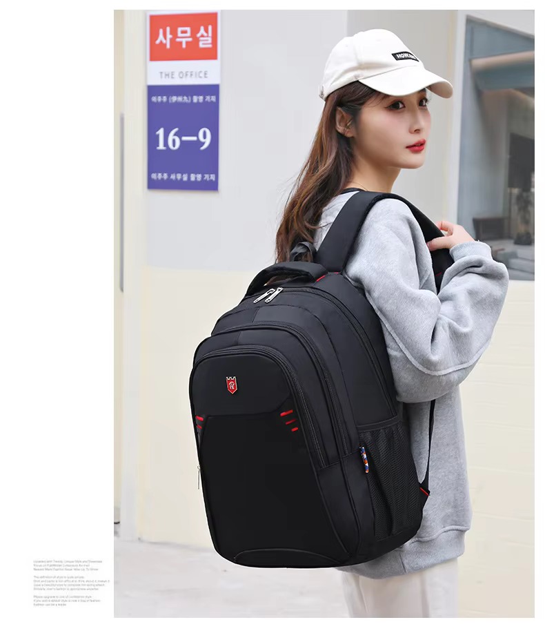 woman wearing red accent backpack side view