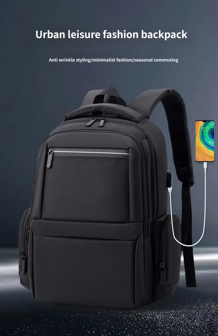 black urban backpack charging phone via USB
