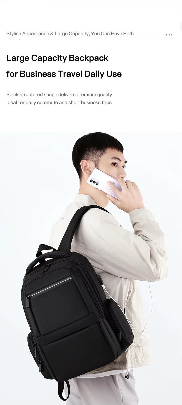 man on phone wearing black backpack