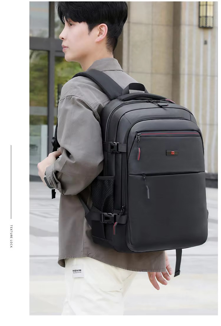 man wearing black backpack side view