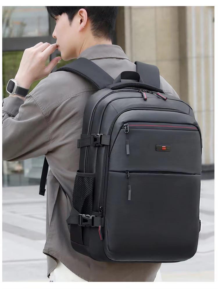man wearing black backpack three-quarter view
