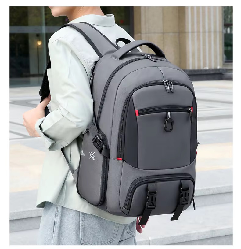 man wearing gray backpack