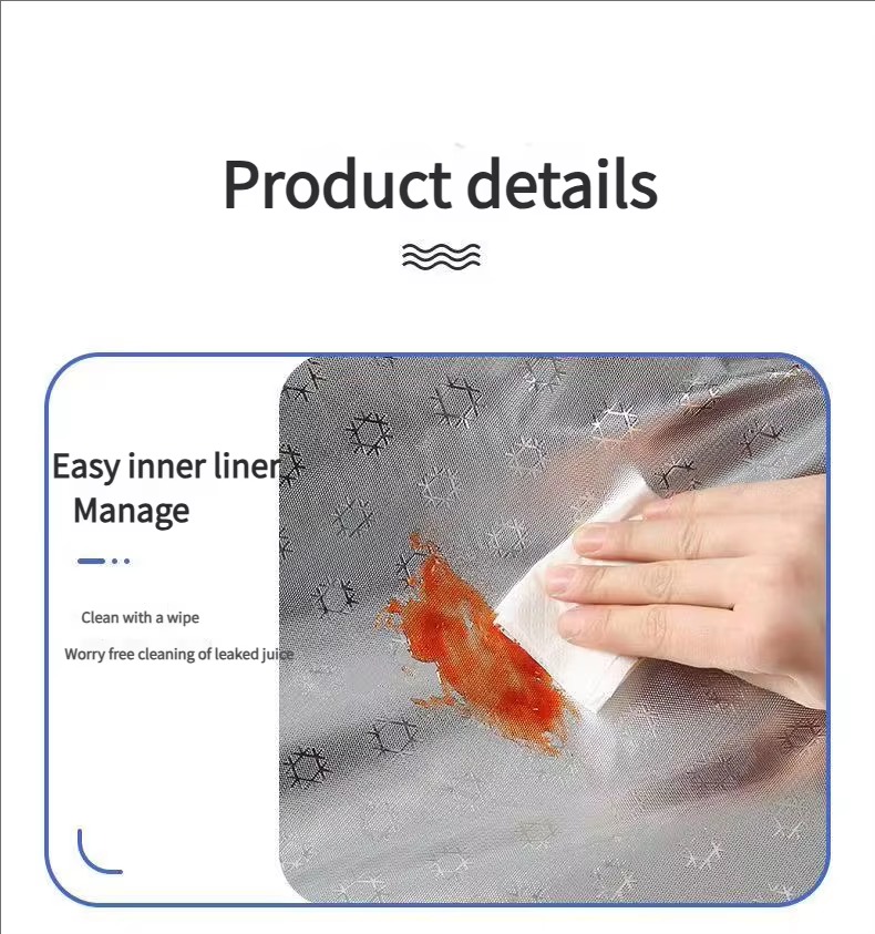 aluminum foil liner being wiped clean of spilled sauce
