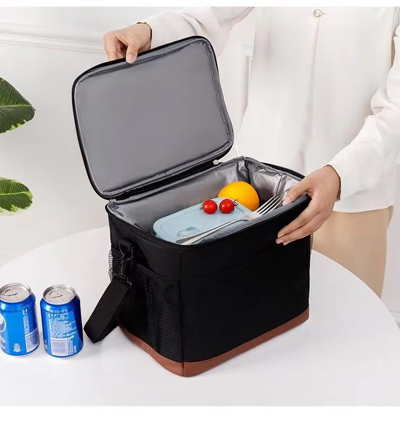 woman packing lunch into open cooler
