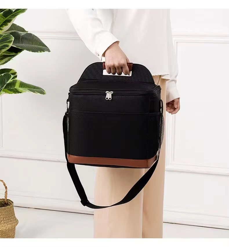 woman carrying cooler by handle