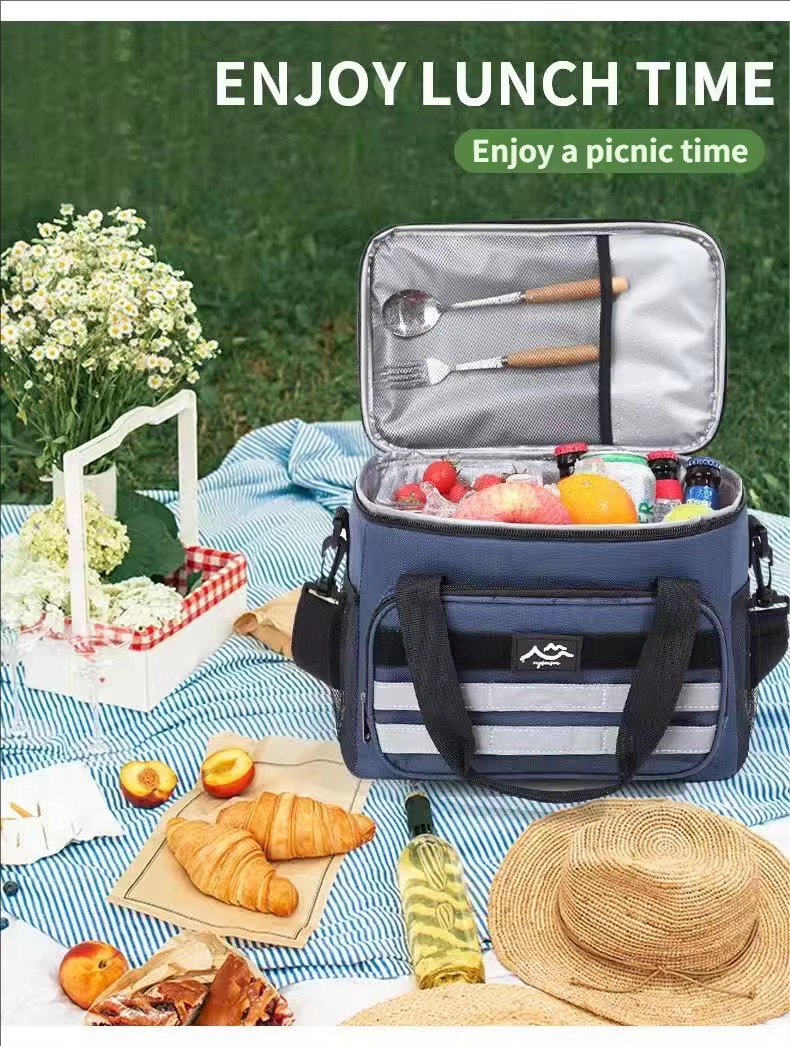 open cooler on picnic blanket with food