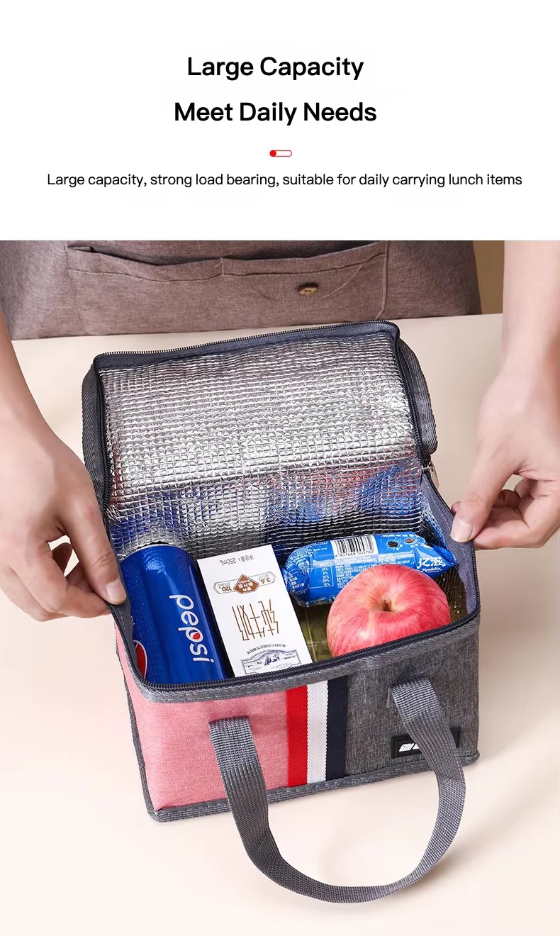 hands opening packed lunch tote with drink and apple