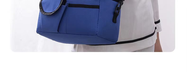 model carrying blue bag on shoulder close-up of curved front pocket