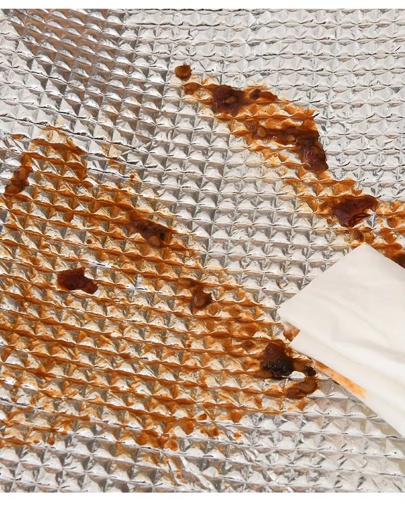 wiping sauce stain from foil lining