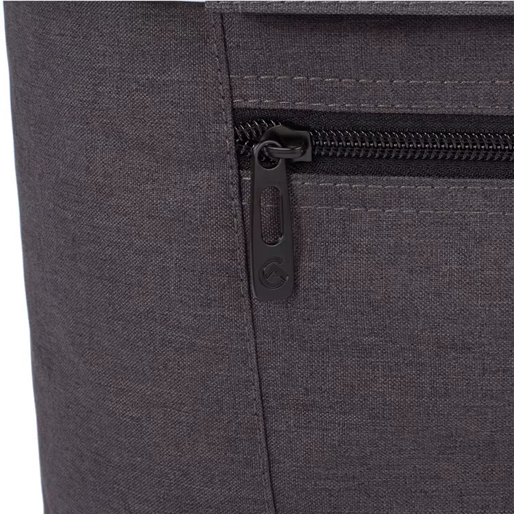 close-up of front zippered pocket with logo pull tab