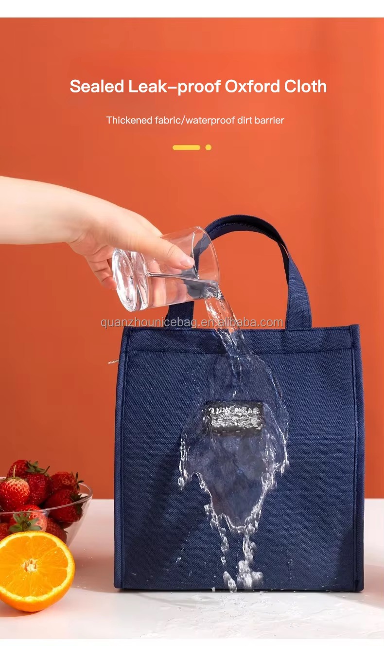 water poured over front of navy bag demonstrating sealed leak-proof oxford cloth