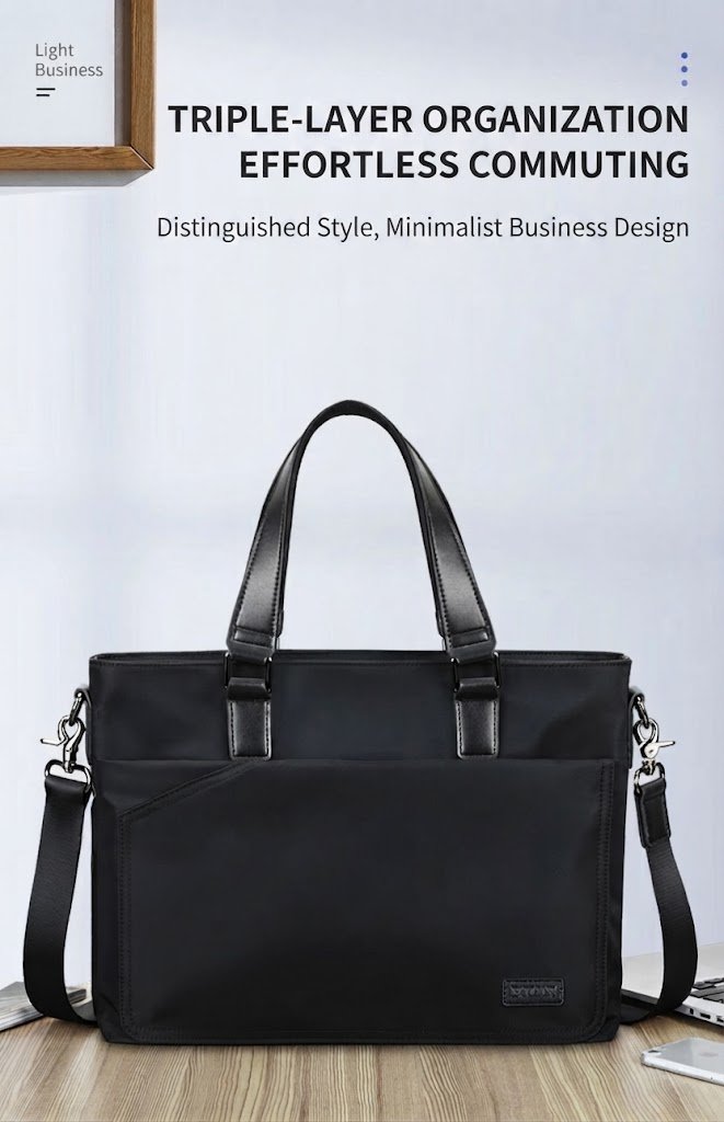 black nylon tote briefcase with triple-layer organization on desk