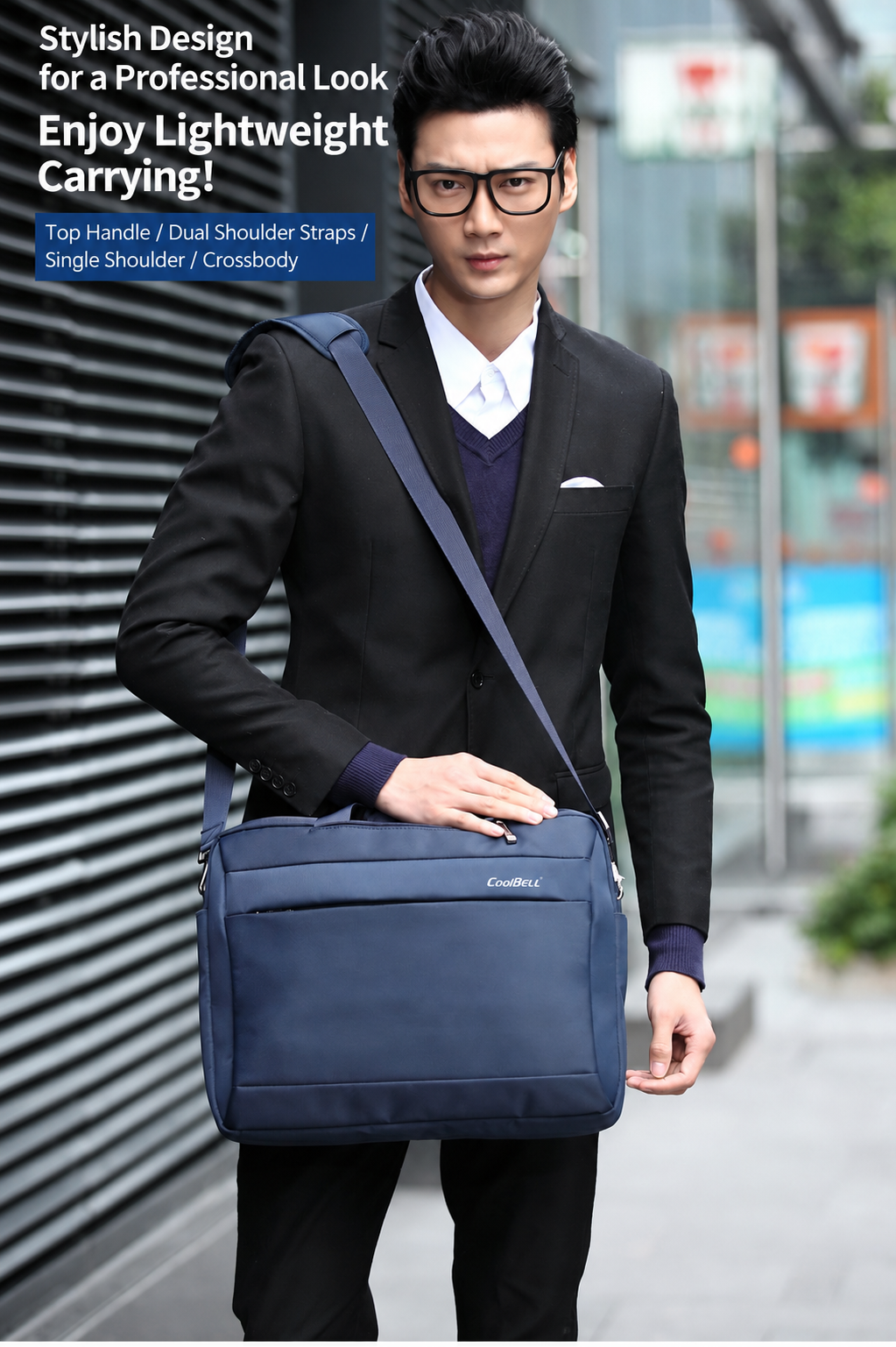 model wearing the bag crossbody in navy blue on a city street