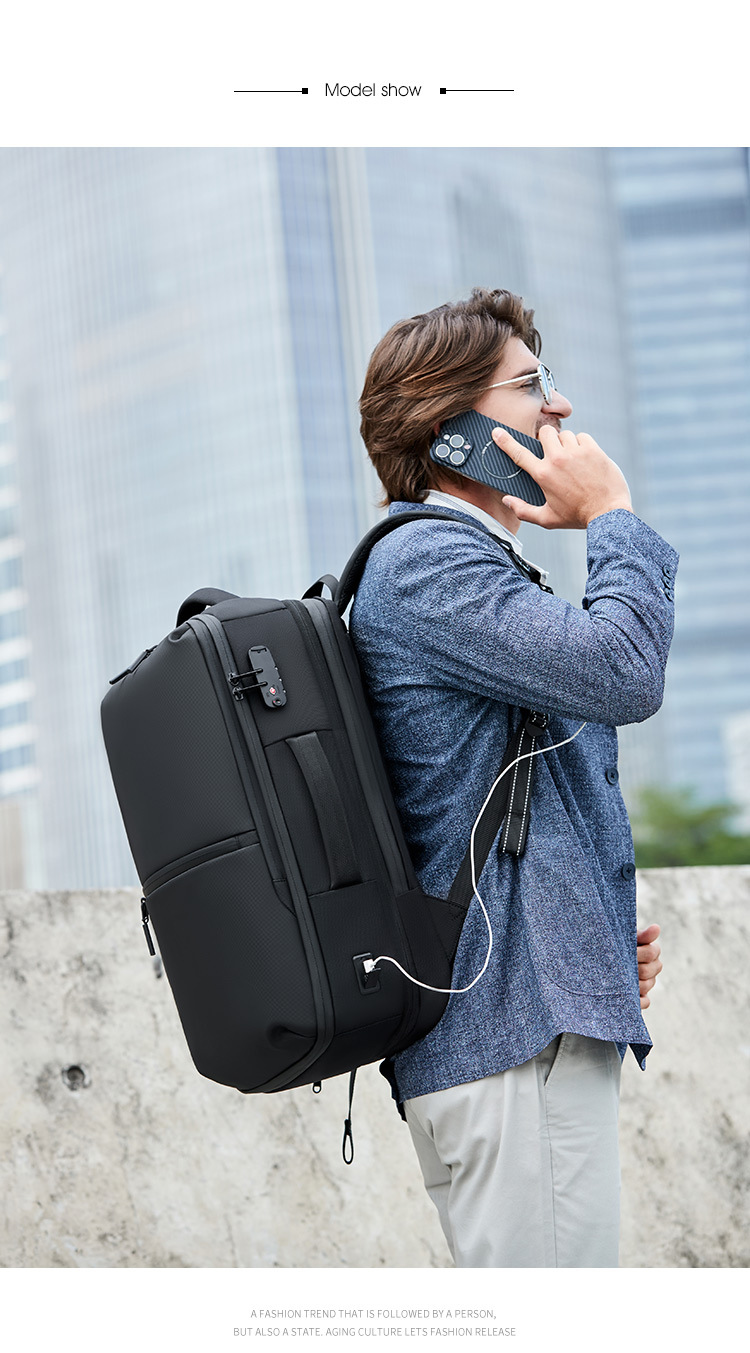 model wearing the backpack outdoors while on a phone call
